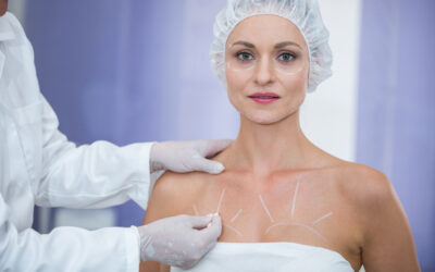 What are the different types of cosmetic breast surgery?